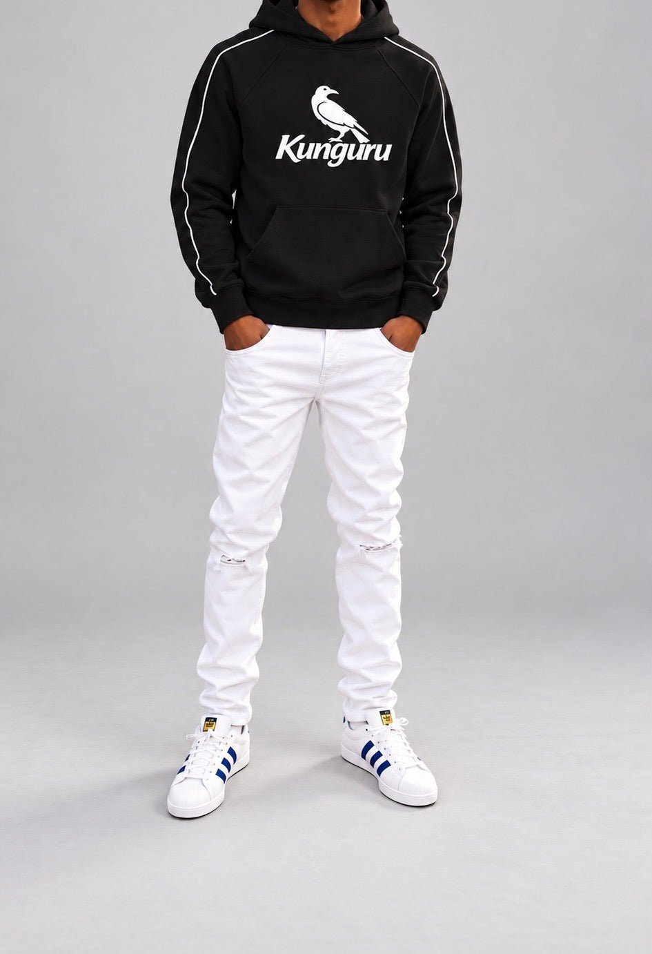 Close-up of the black Kunguru hoodie with white crow logo and sleeve piping